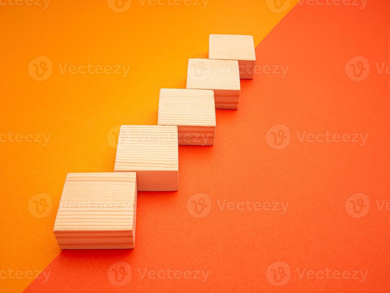 Blank five wooden cubes on colorful background with space for text photo