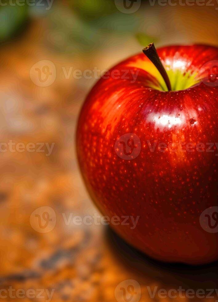 A red apple sitting on a table photo
