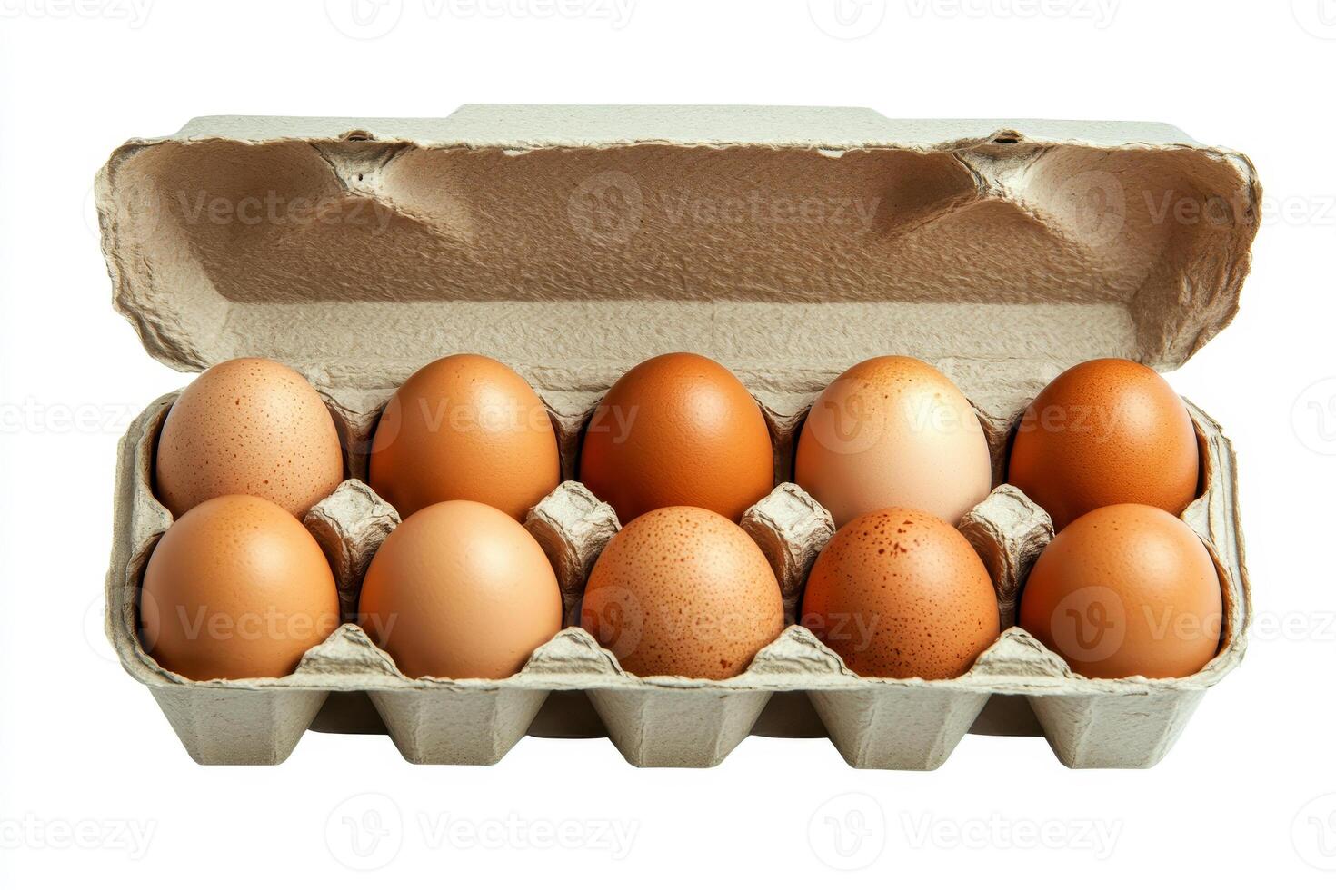 An open egg box containing ten brown eggs is isolated on a white background, emphasizing fresh organic chicken eggs stored in a carton pack with ample copy space provided. photo