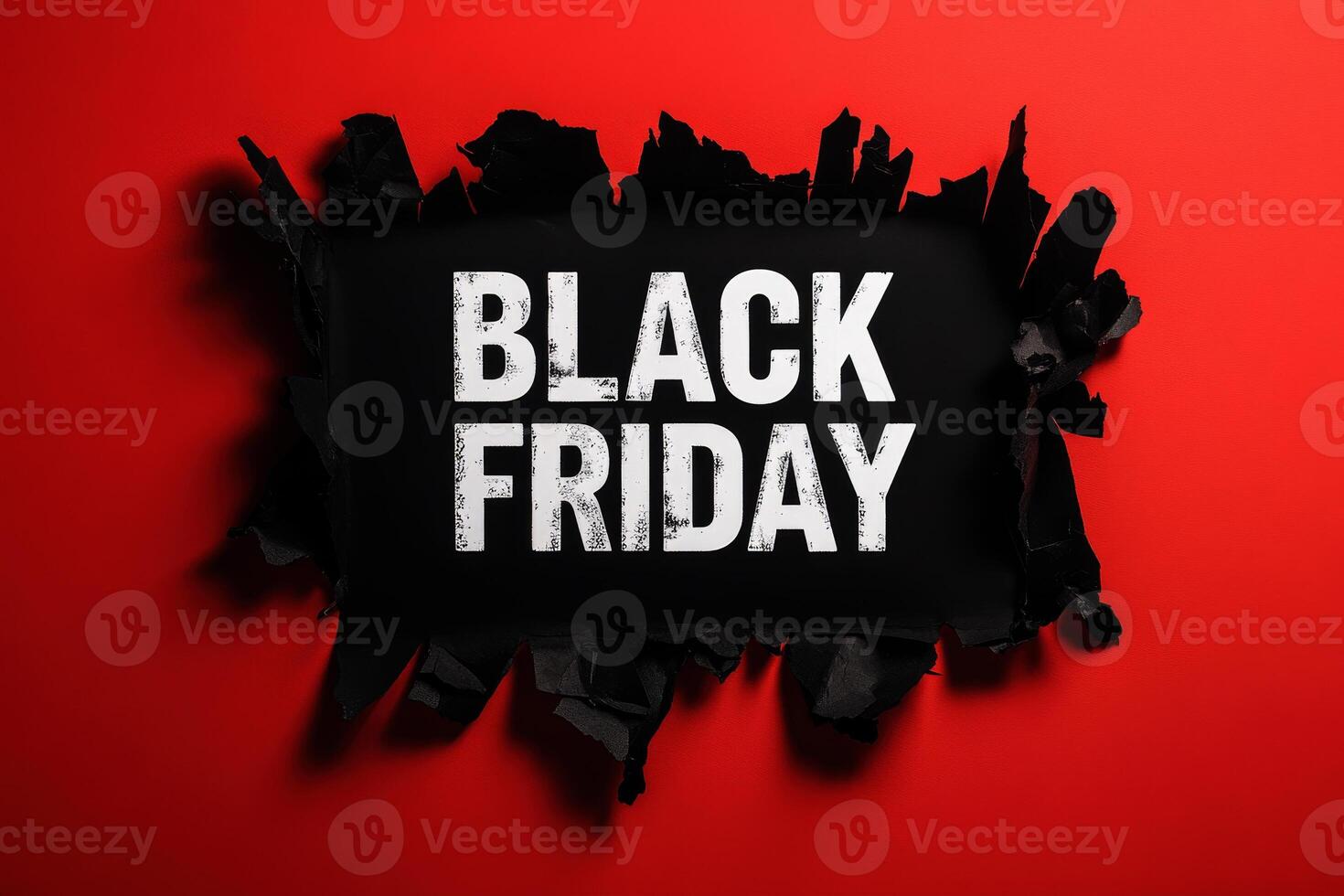 Black torn paper and the text black friday on a red background. Black Friday composition. photo