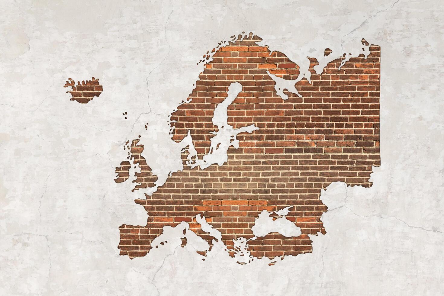 Europe map on antique brick wall texture background. photo