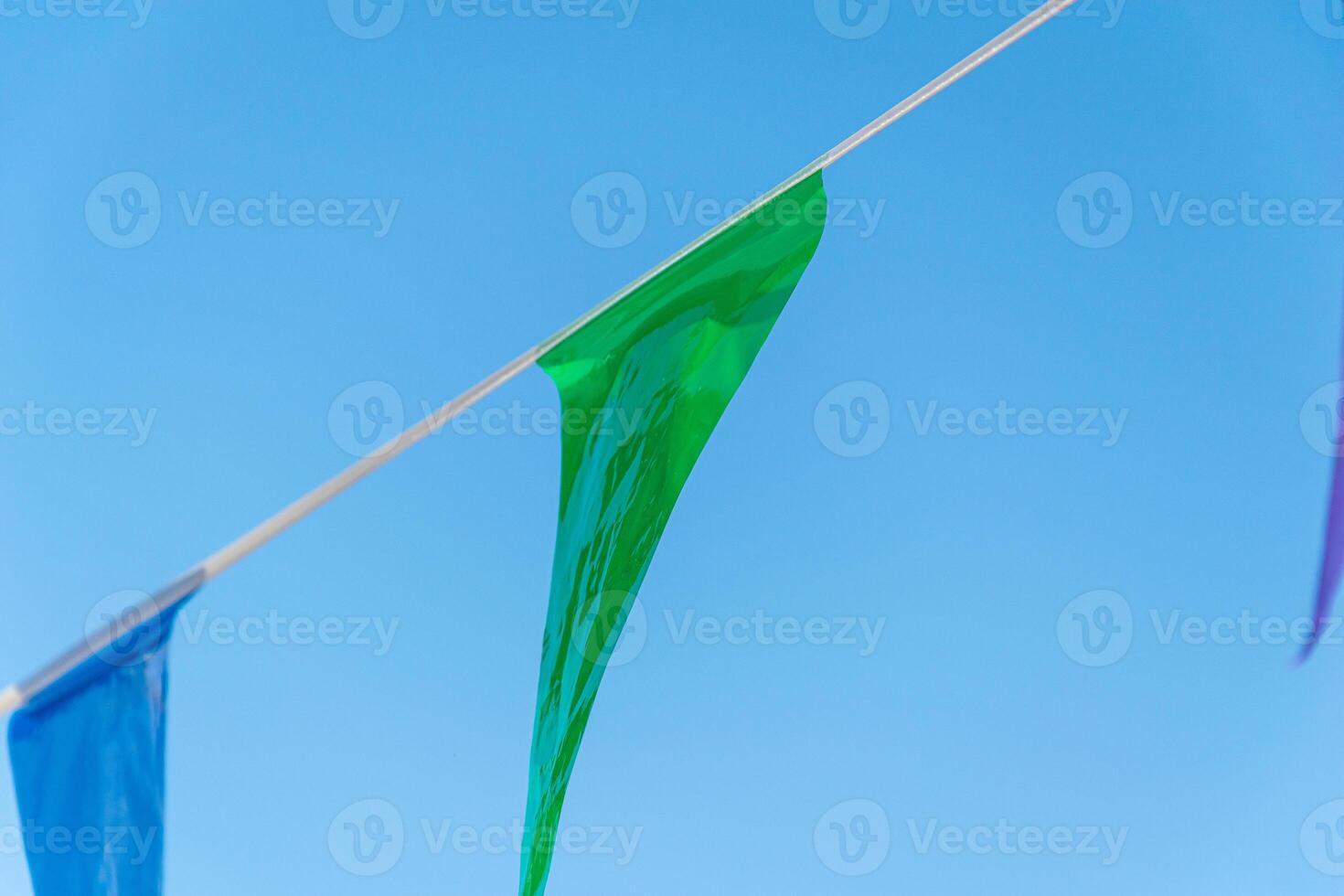 green plastic banner for street decoration at festivities and events photo