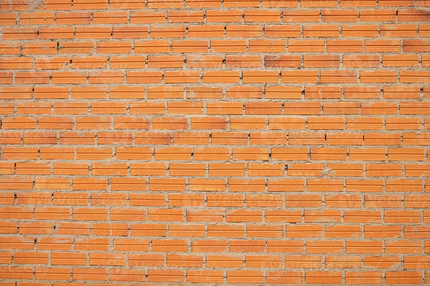 new large red brick wall orange bricks background new wall texture site under construction photo