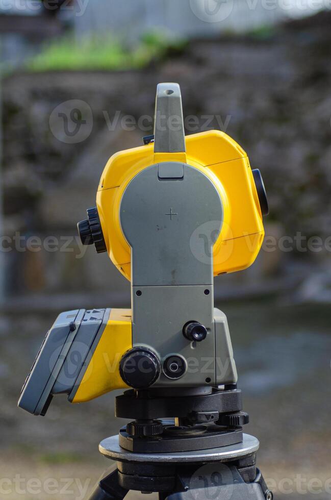 side view of a total station, topographic survey instrument photo