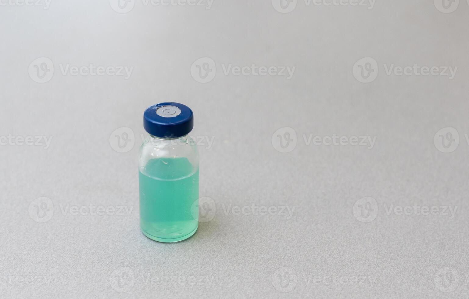 Vaccine vial dose flu shot drug needle syringe,medical concept vaccination hypodermic injection treatment disease care hospital prevention immunization illness disease photo