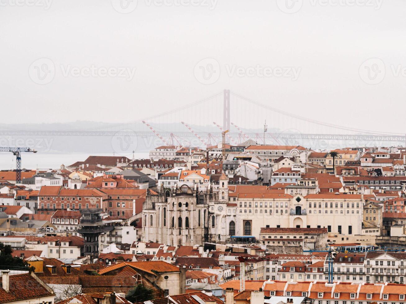 Aerial view of Lisbon's historic center with red-tiled roofs photo