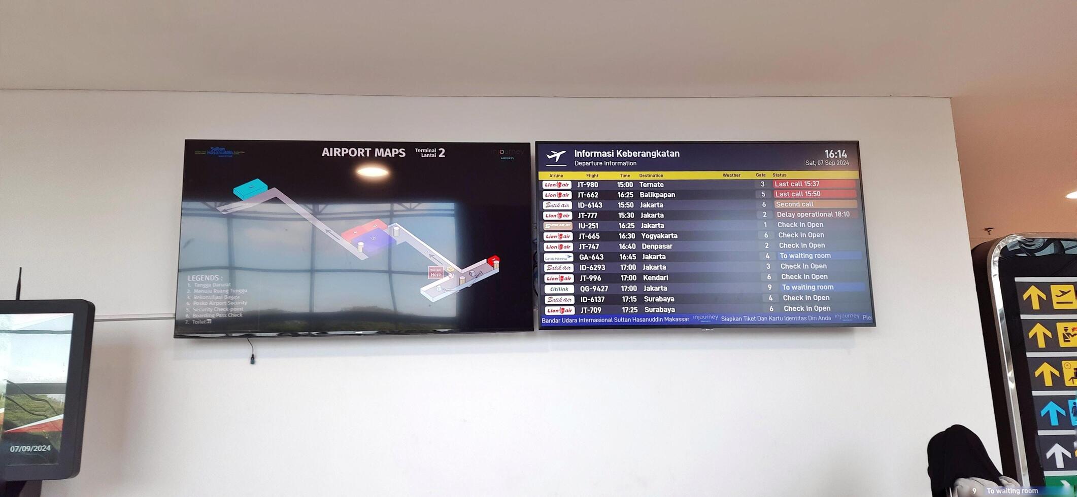 Atmosphere and view of passengers activity at Sultan Hasanuddin International airport terminal. Makassar, South Sulawesi, Indonesia - September 7 2024 photo