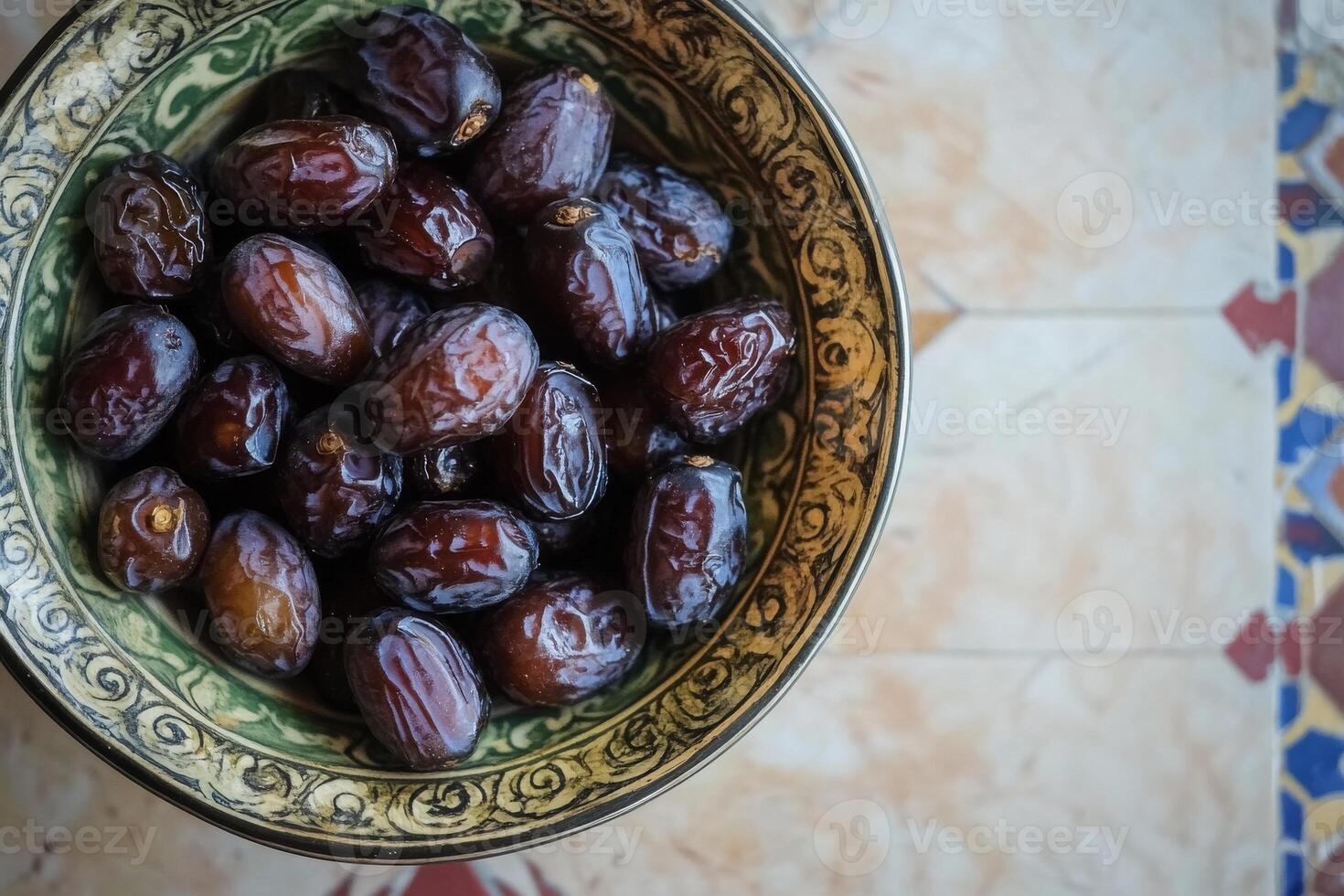 A bowl of dates on a table photo