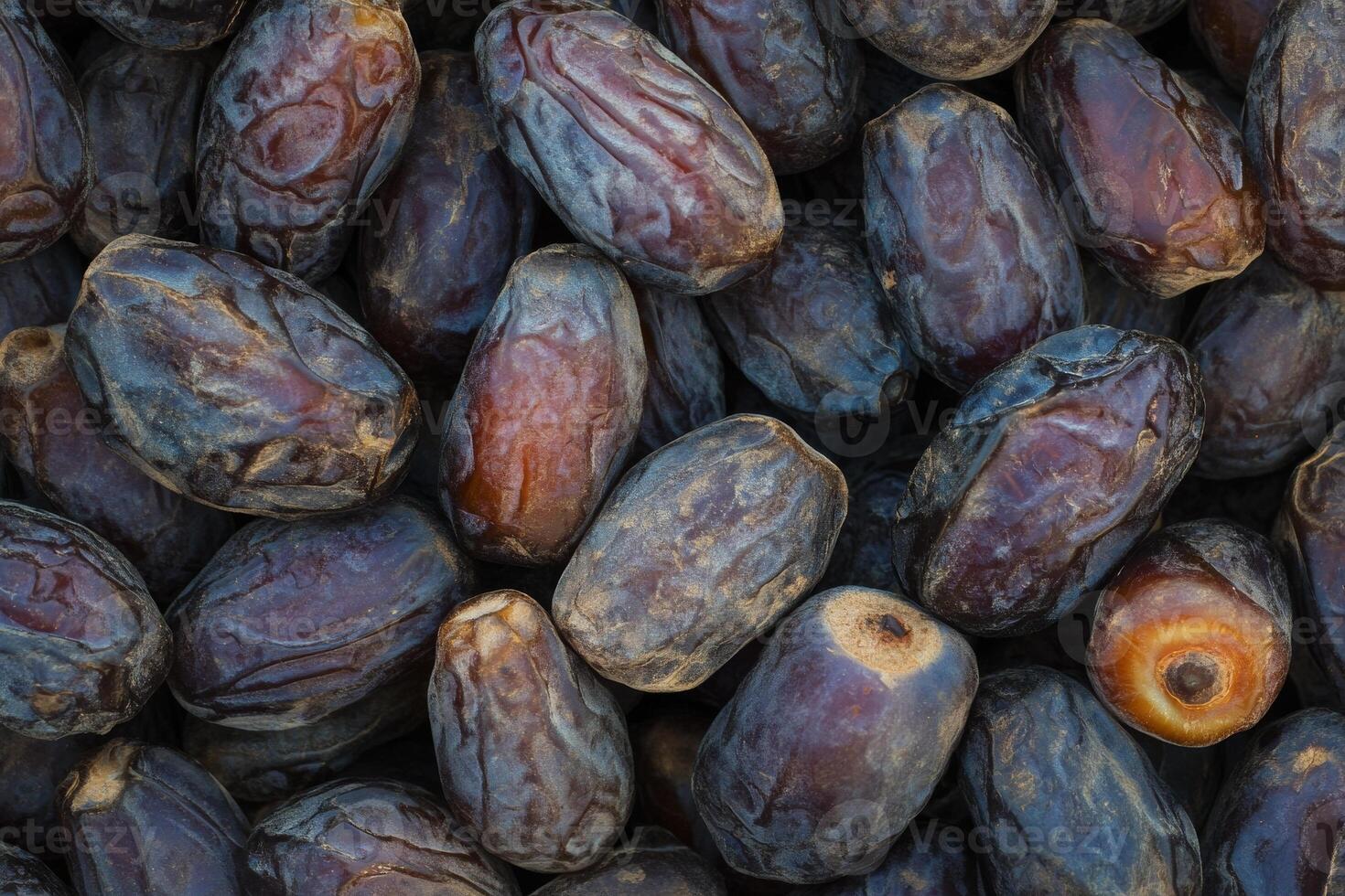 A close up of a bunch of dates photo