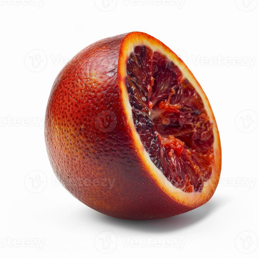 A blood orange is cut in half photo