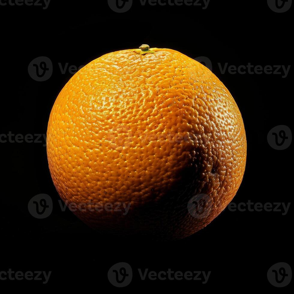 An orange is shown on a black background photo