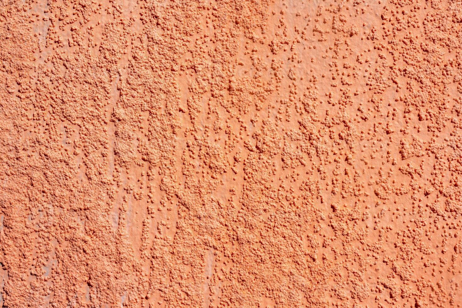 Texture of rough beige plaster. Architectural abstract background. photo