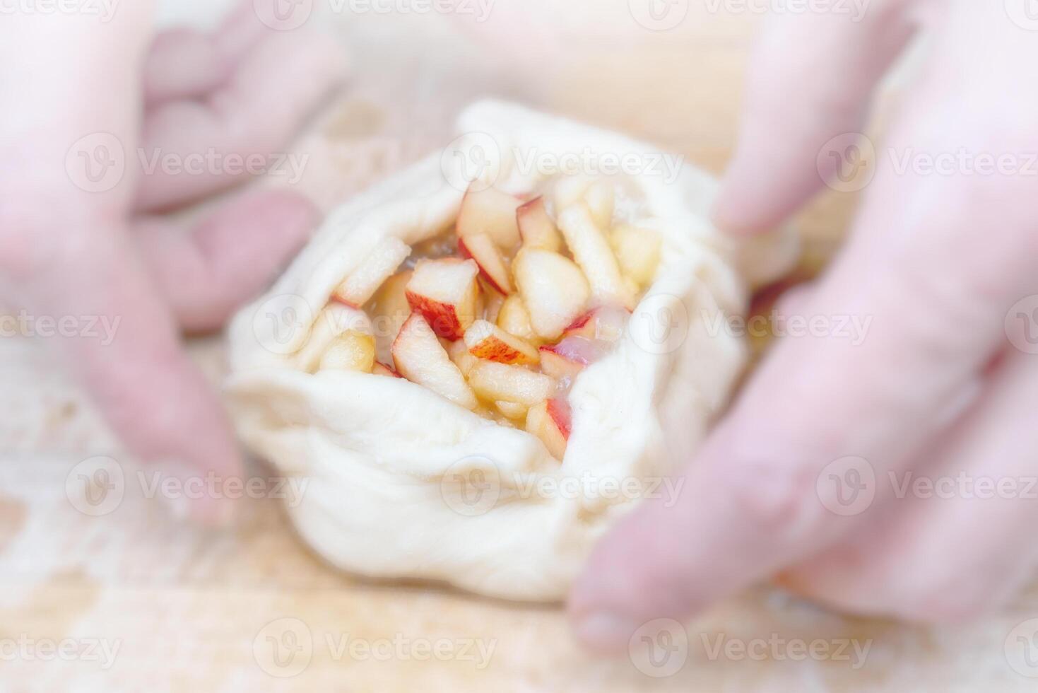Apple pie. Dough products. Bake dessert in the kitchen at home. Homemade food recipe. photo