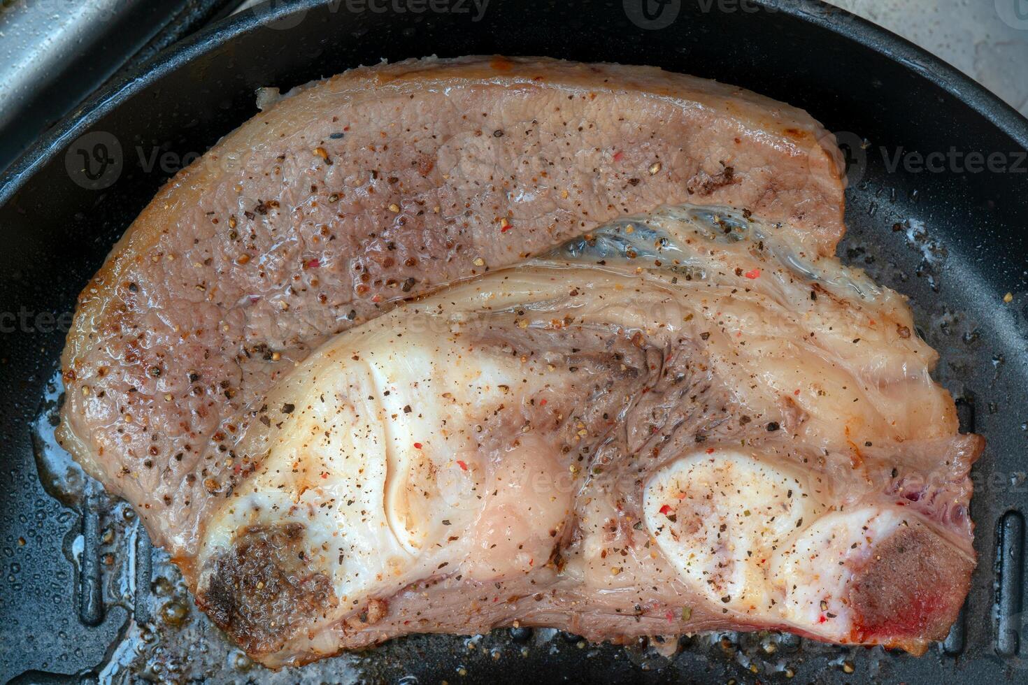 Breast of beef on the bone. Cooking in the kitchen. photo