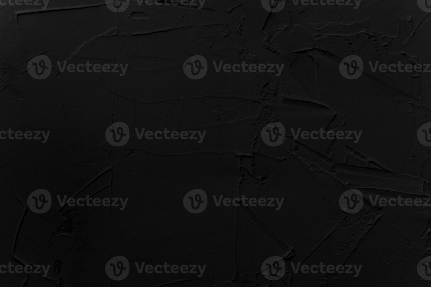 Abstract black background. Black stucco texture. Dark rough surface. photo