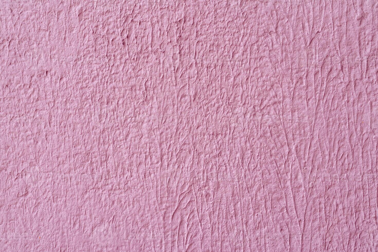 Gray stucco on wall of house. Construction industry. photo