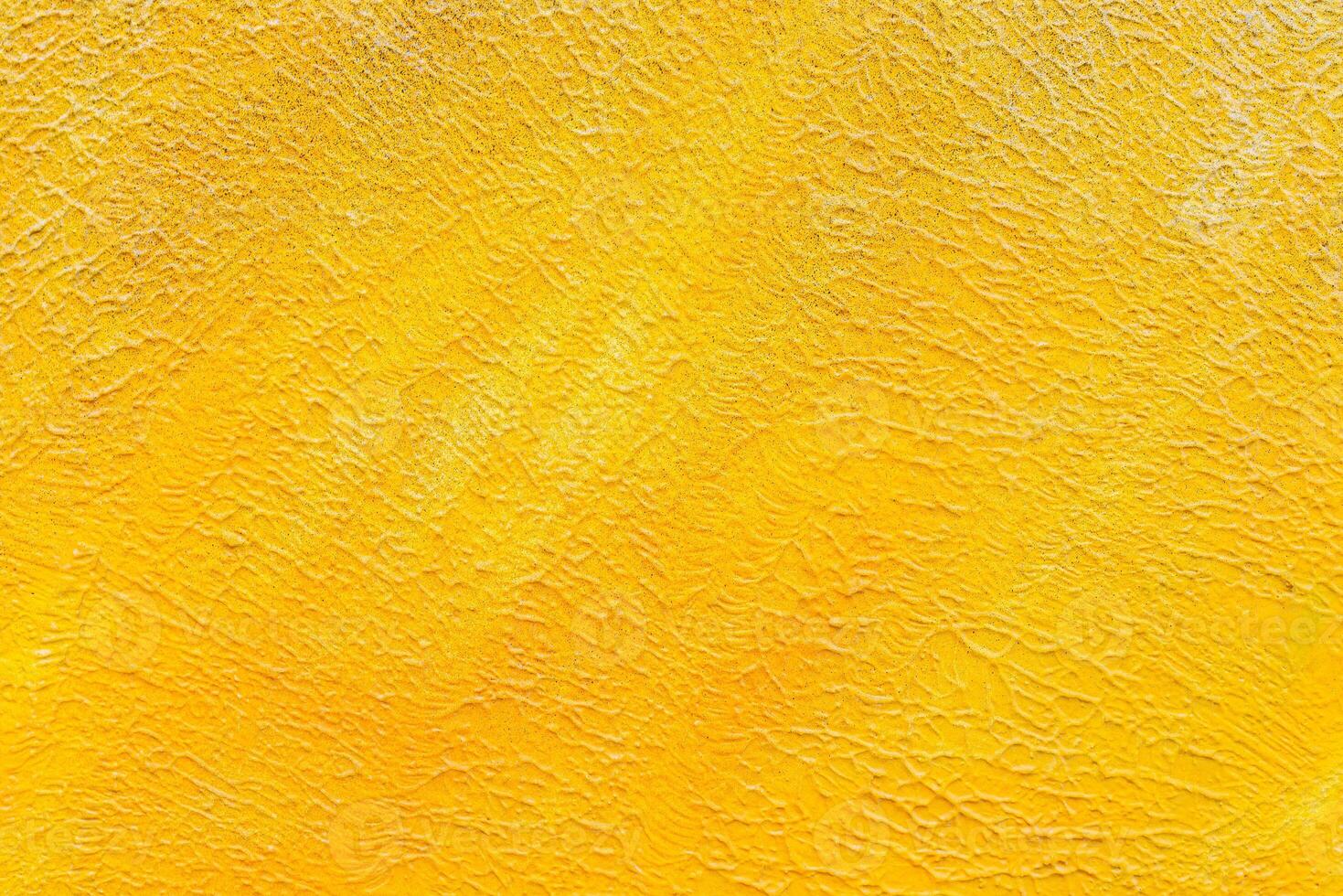 Texture of yellow stucco for modern interior. Abstract pink background. photo
