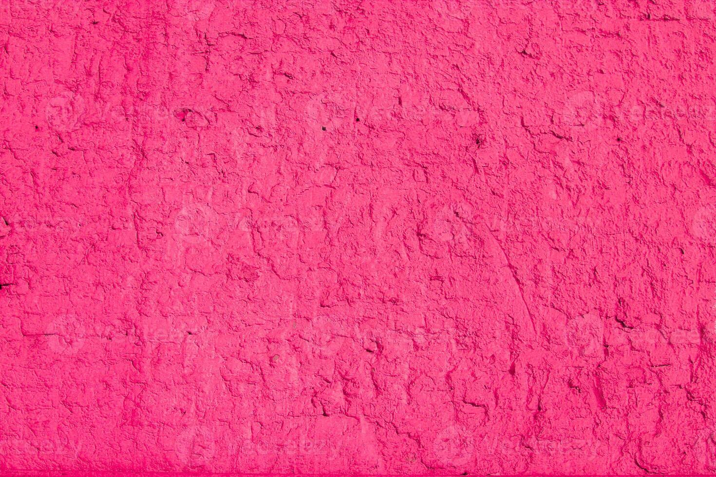 Abstract pink background. Pink color of rough surface. photo