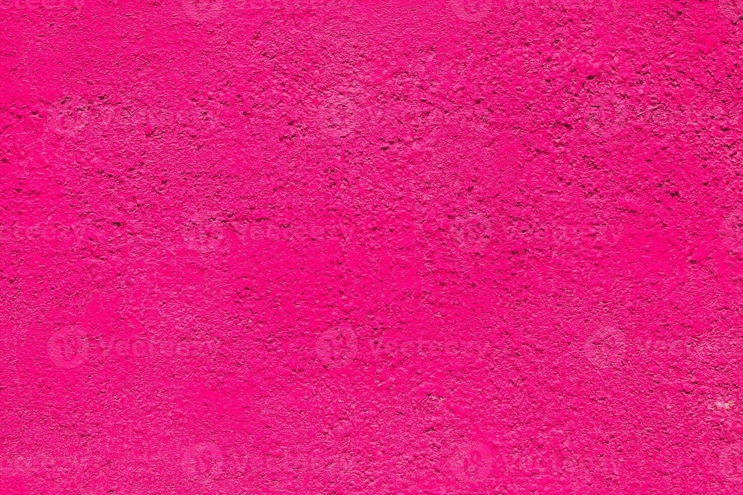 Abstract pink background. Pink color of rough surface. photo