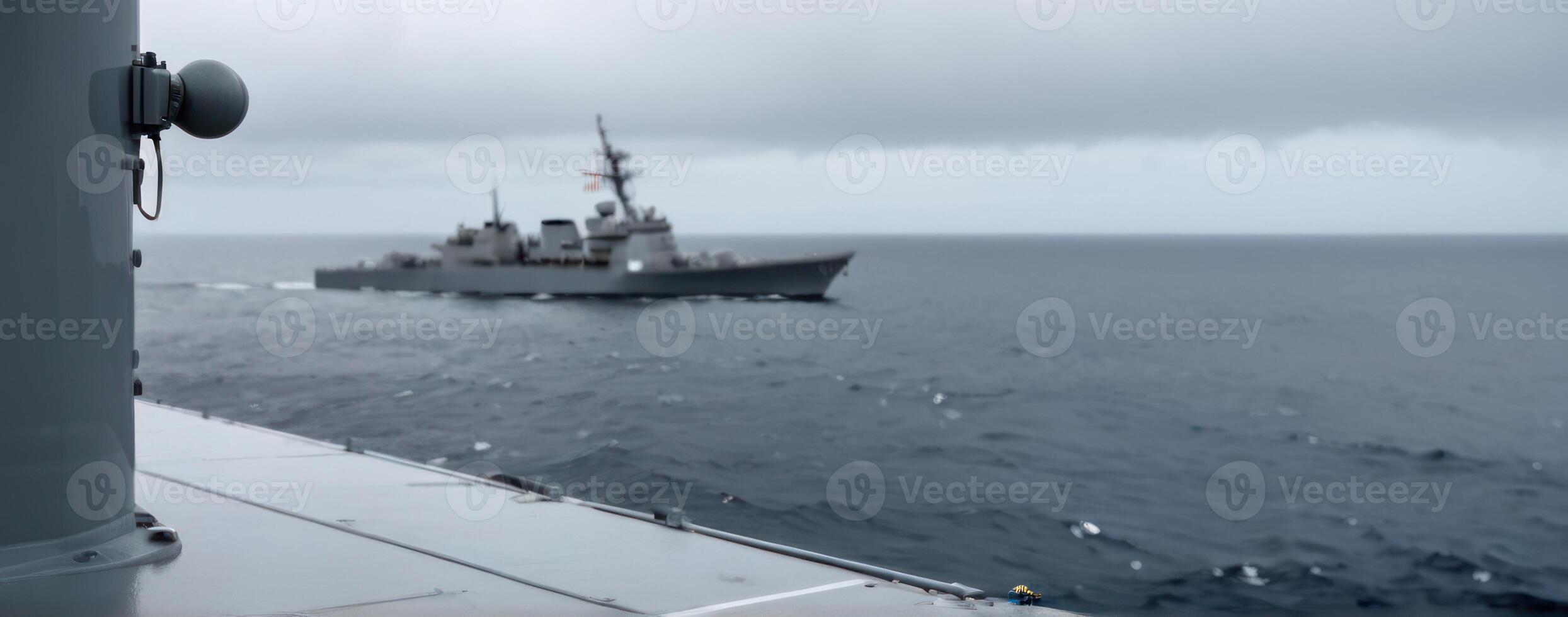 A navy ship in the ocean photo
