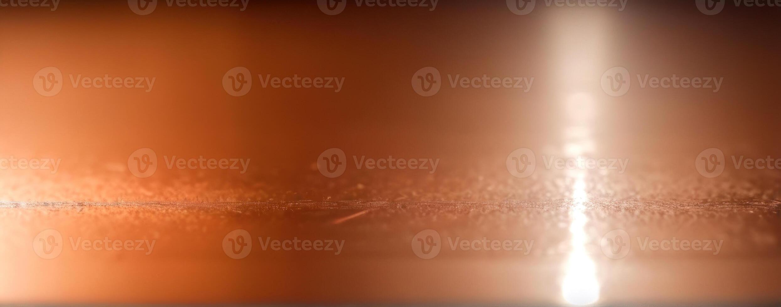 A blurry image of an orange metal surface photo