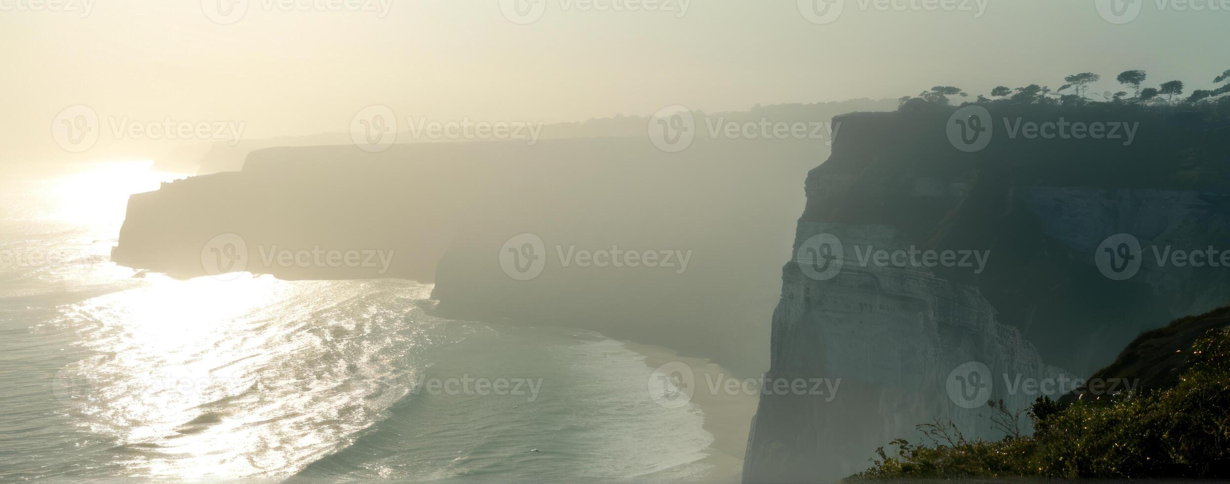 A cliff overlooking the ocean photo