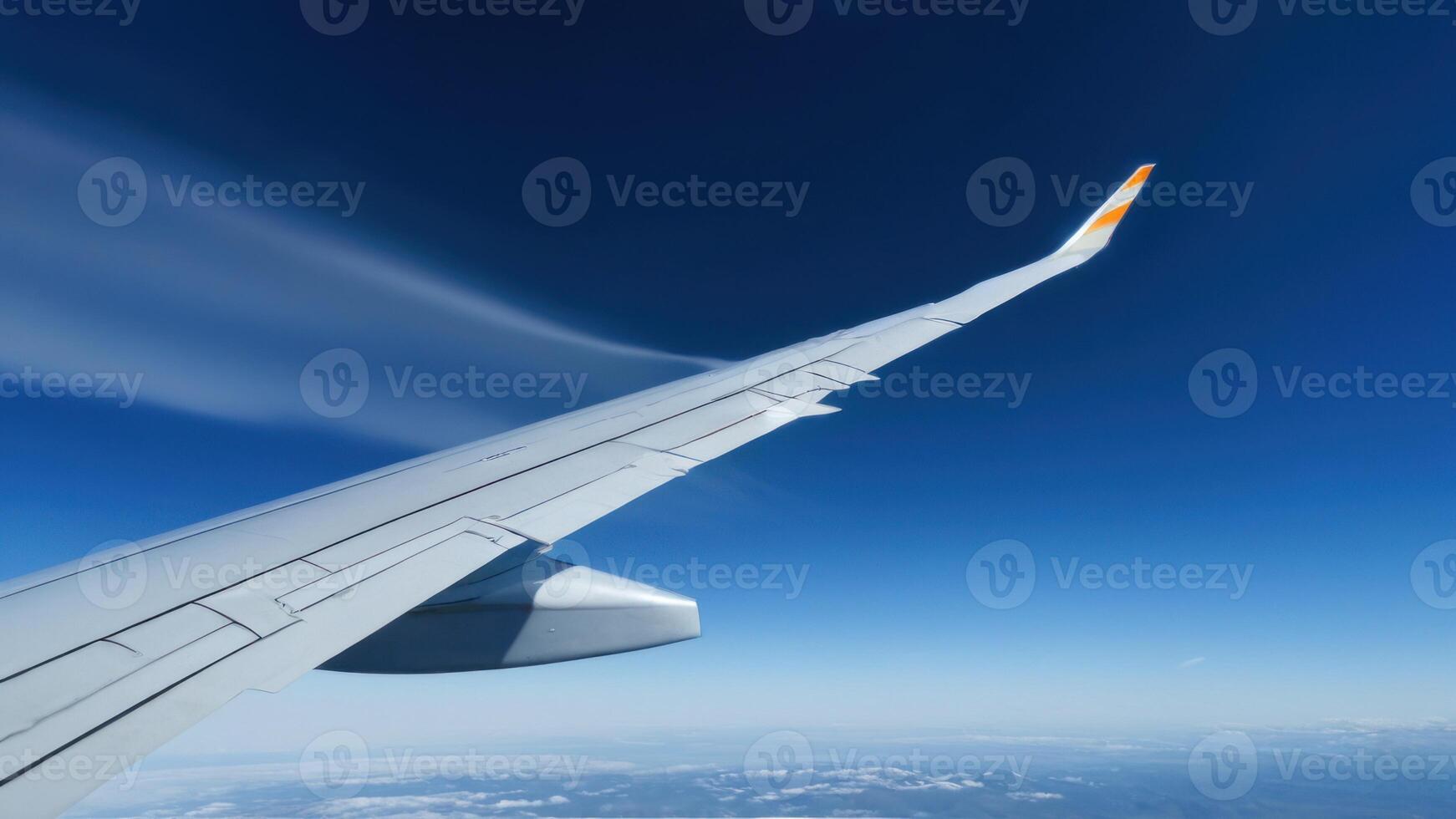 The wing of an airplane in the sky photo