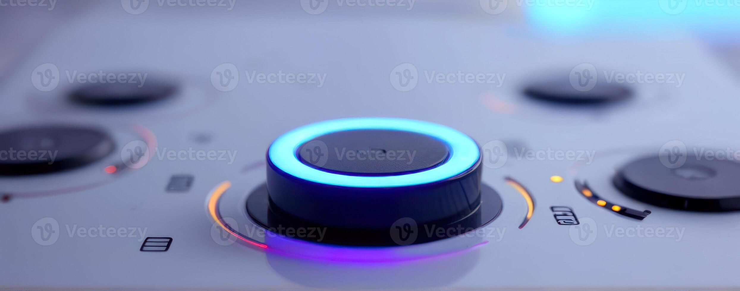 Close up of a blue button on an electronic device photo