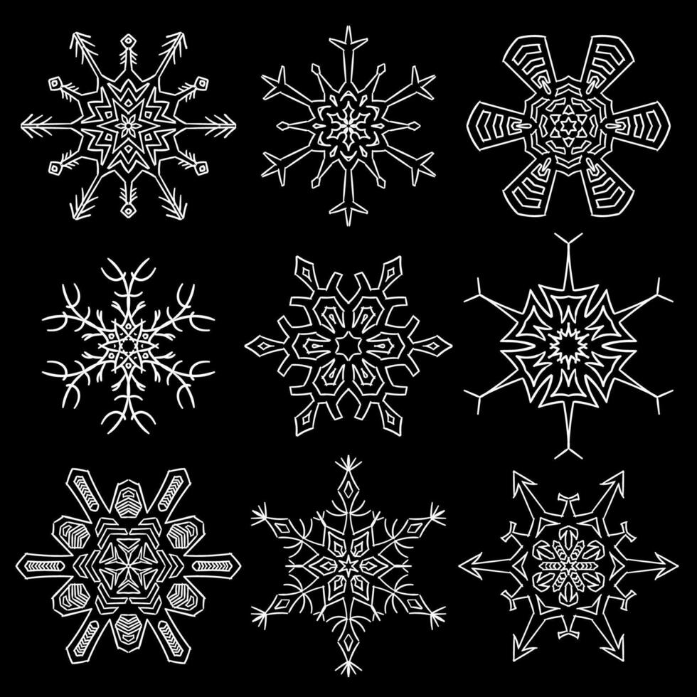 Set of drawn snowflake silhouettes vector