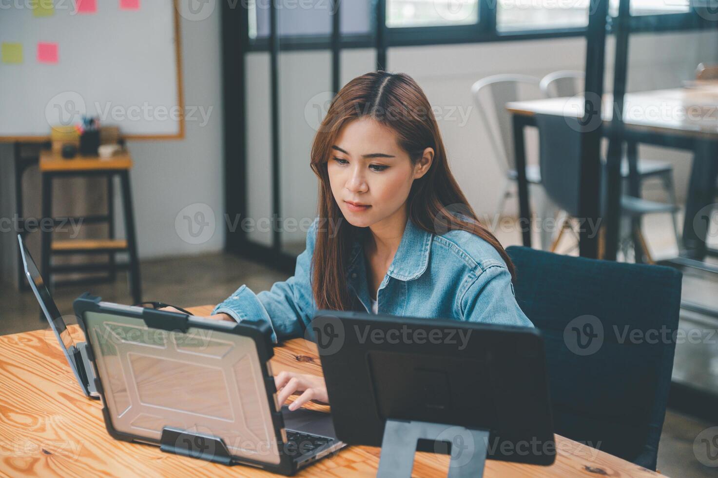 Female programmers are thinking and planning to work on programming, software coding and web design.Concept technology development. photo