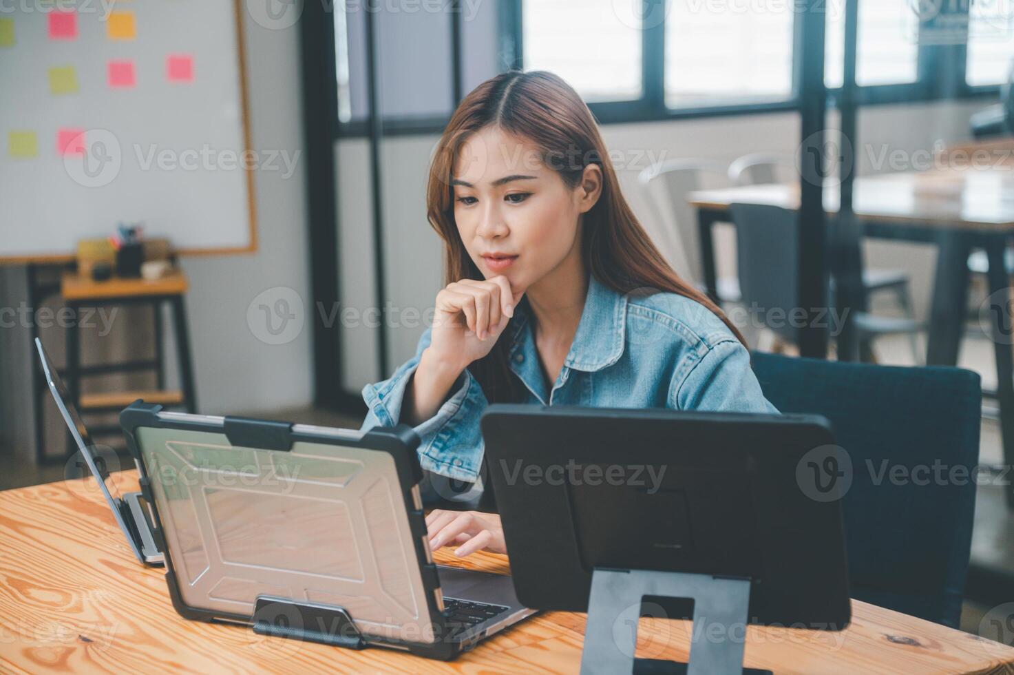 Female programmers are thinking and planning to work on programming, software coding and web design.Concept technology development. photo