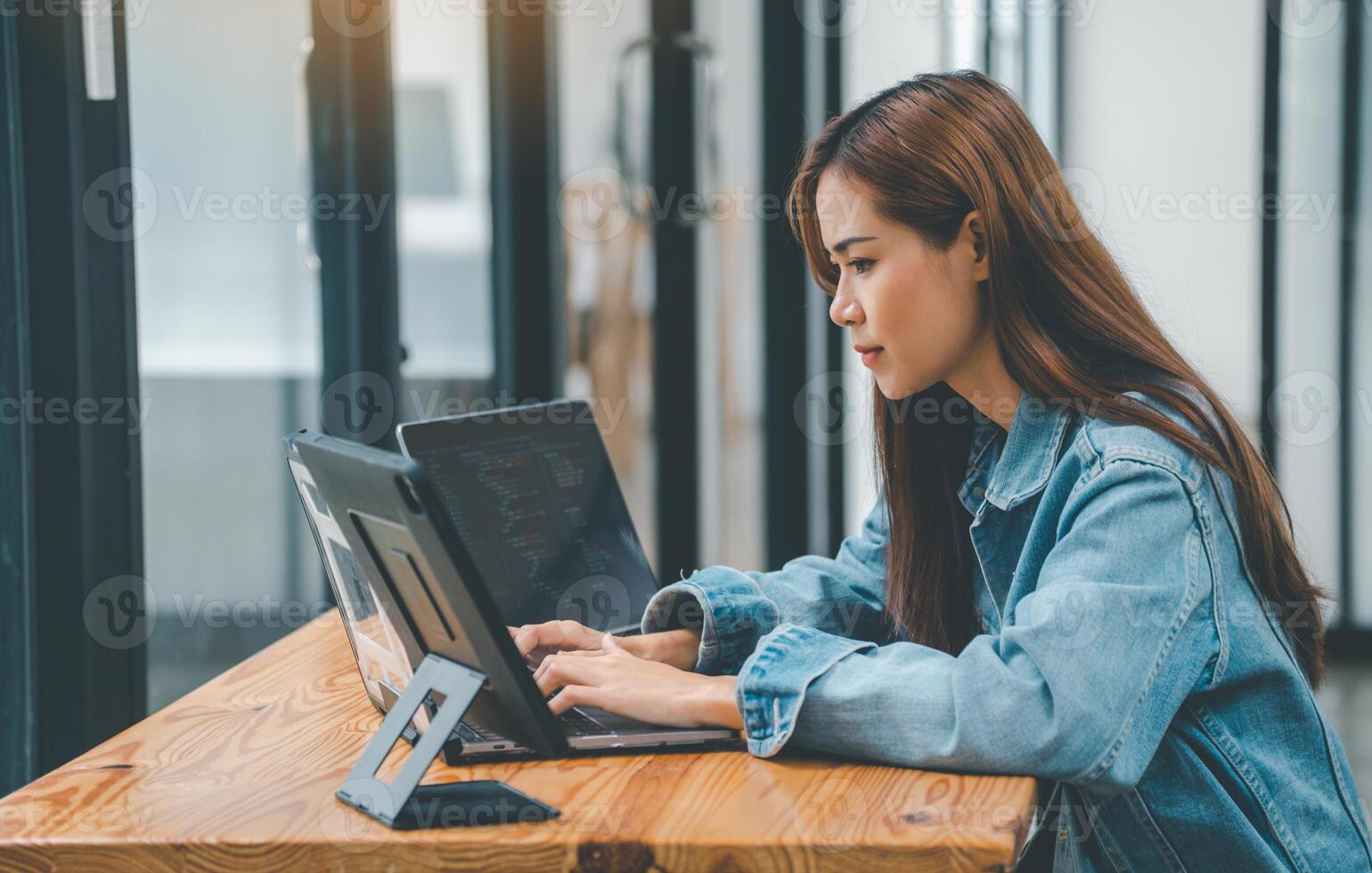 Female programmers are thinking and planning to work on programming, software coding and web design.Concept technology development. photo