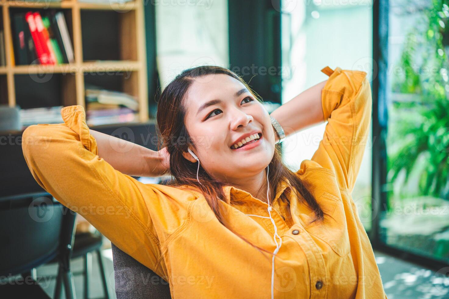 businesswoman is doing a relaxing pose to relieve fatigue after working for a long time. photo