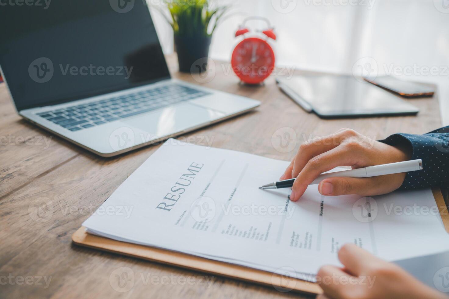 Individuals or recent grads looking for work and filling out a job application should first evaluate the application before applying for a position. photo