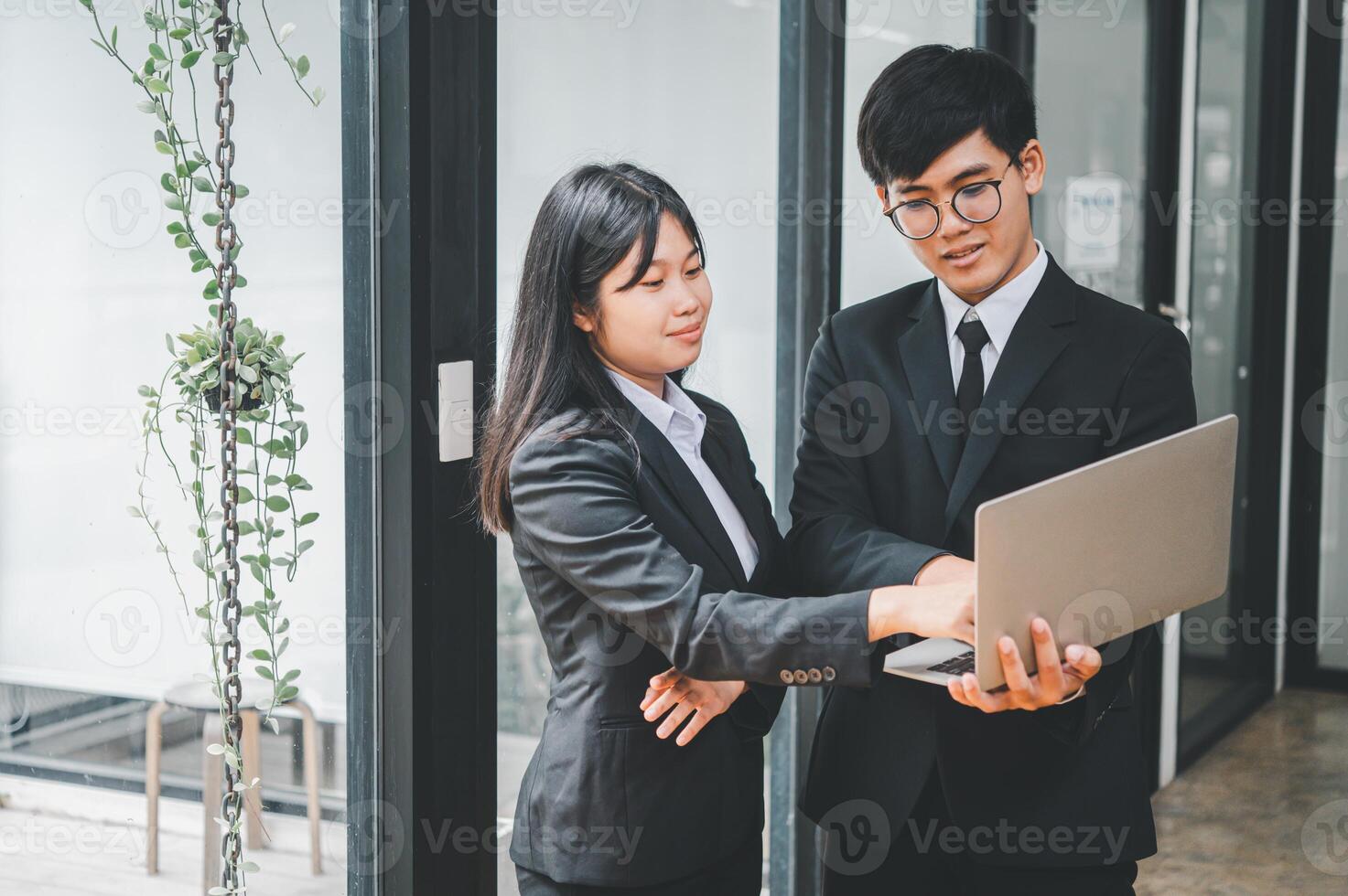 group of business people working and communicating together in the office With the charging of graphs for analysis, conceptual analysis and business planning photo