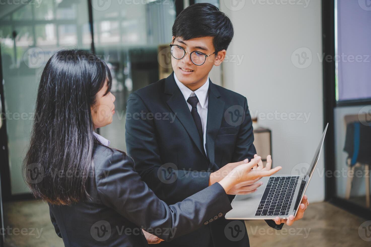 group of business people working and communicating together in the office With the charging of graphs for analysis, conceptual analysis and business planning photo