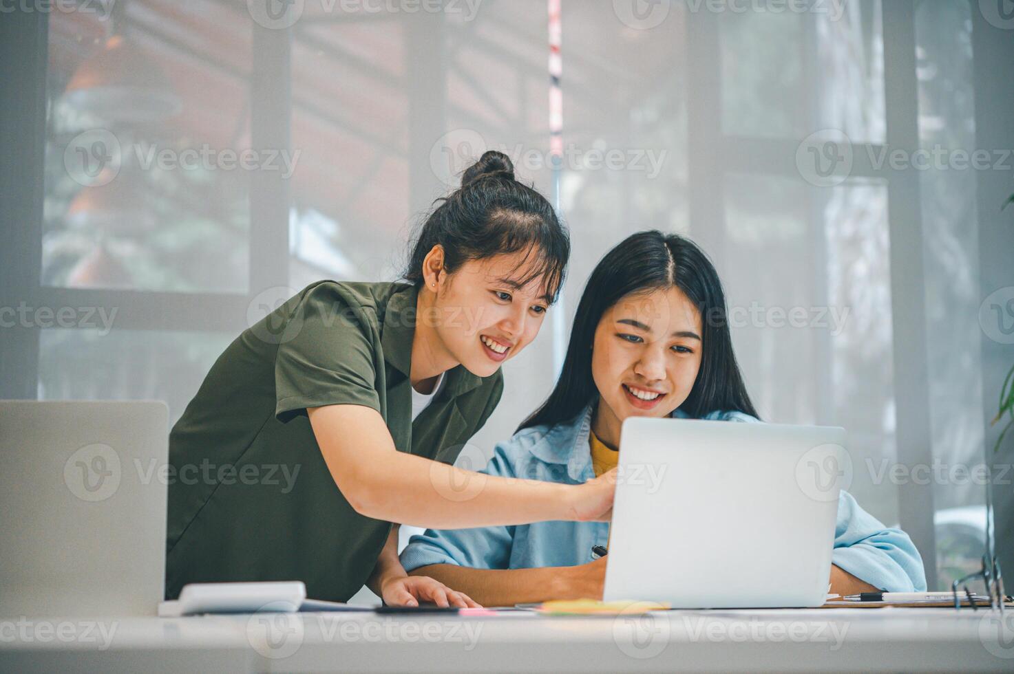 group of business people working and communicating together in the office With the charging of graphs for analysis, conceptual analysis and business planning photo