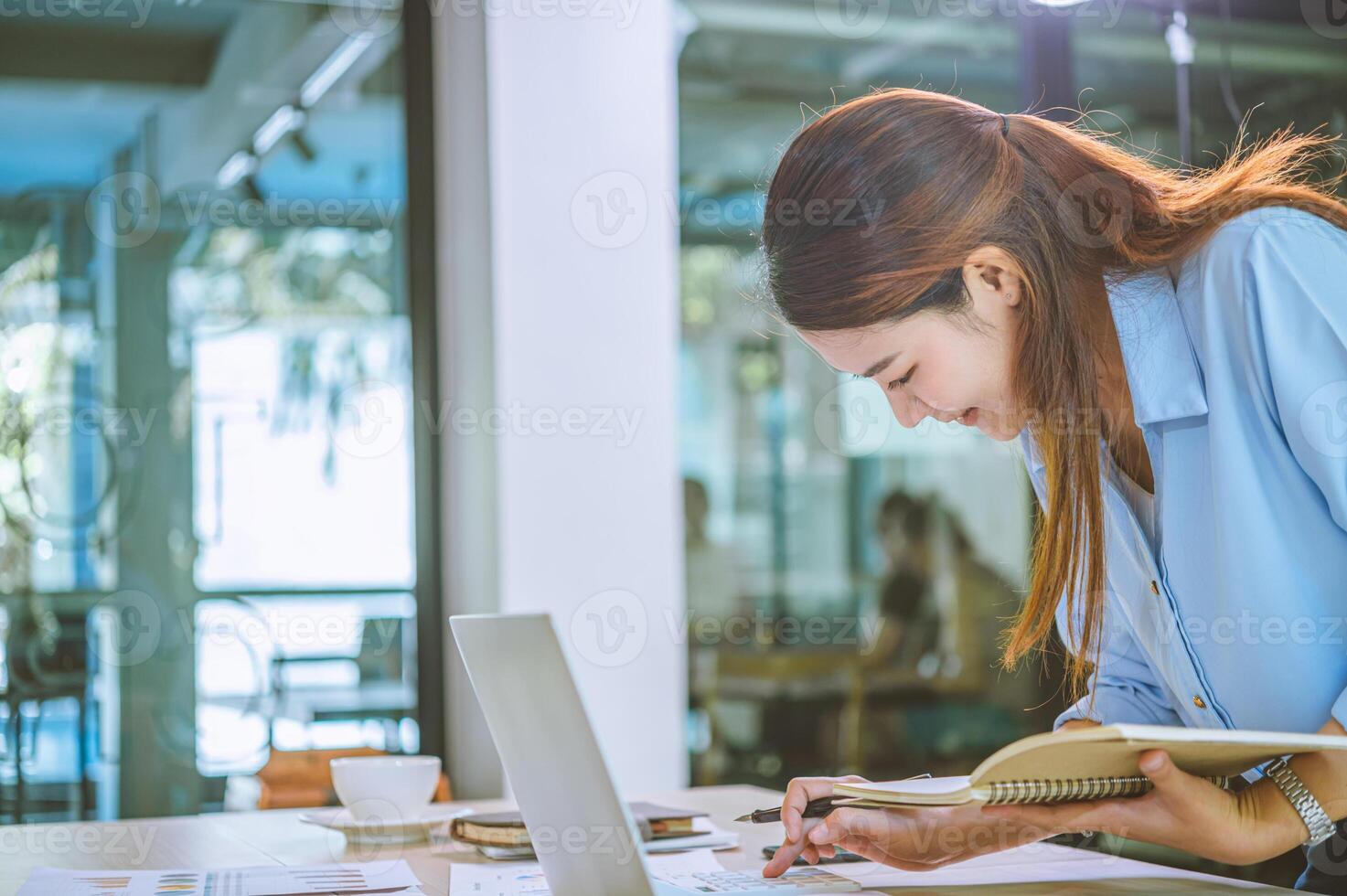 businessman pointing with pen on business report chart are working on accounts in business analysis with graphs and documentation. photo