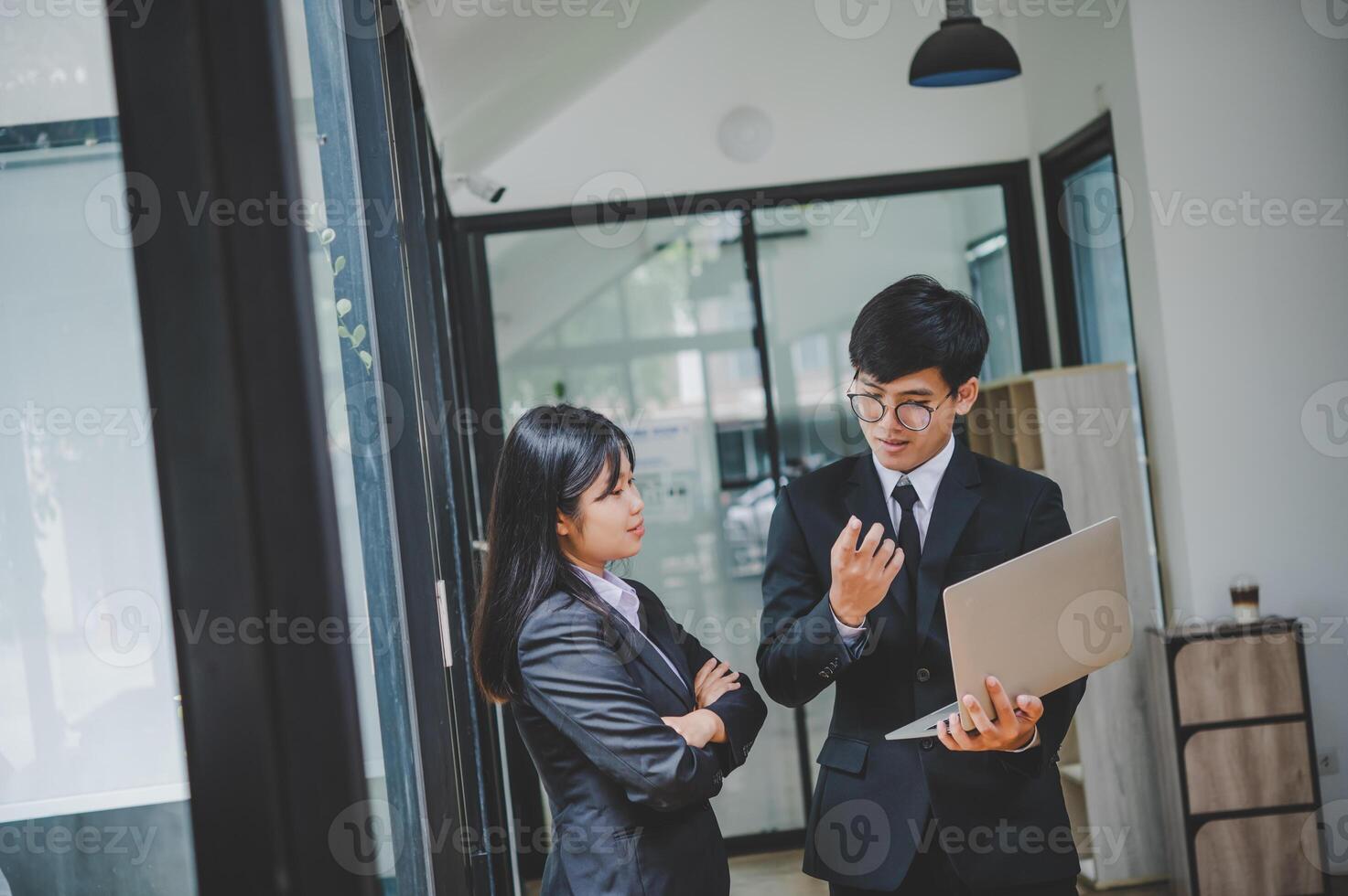 group of business people working and communicating together in the office With the charging of graphs for analysis, conceptual analysis and business planning photo