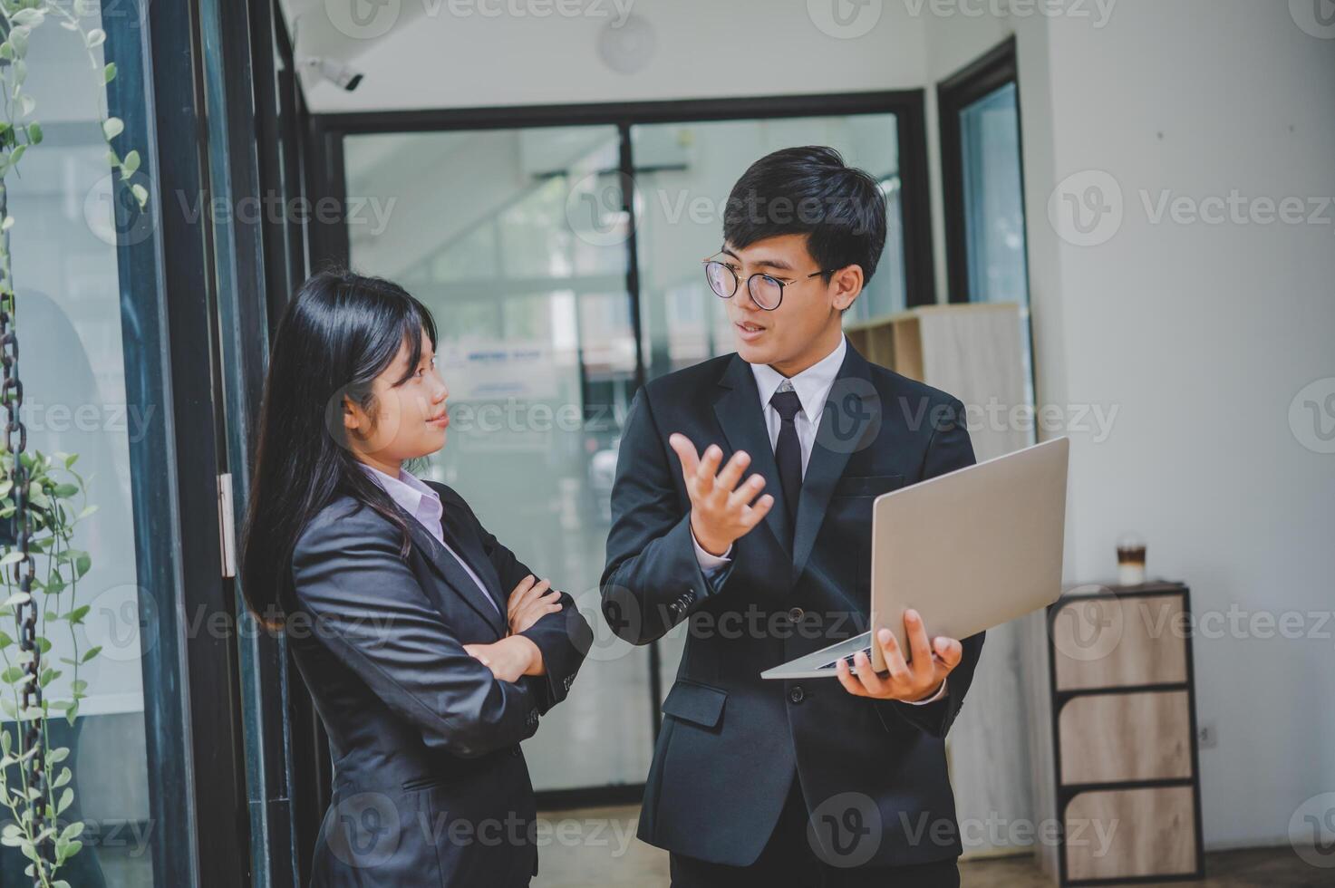 group of business people working and communicating together in the office With the charging of graphs for analysis, conceptual analysis and business planning photo
