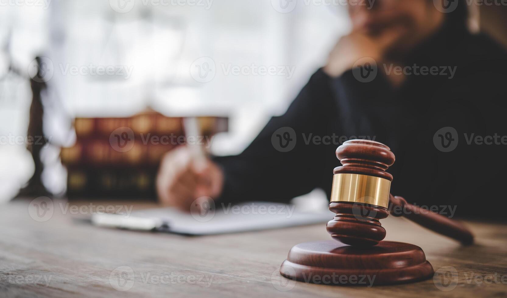 Law theme, mallet of the judge, law enforcement officers, evidence-based cases and documents taken into account. photo