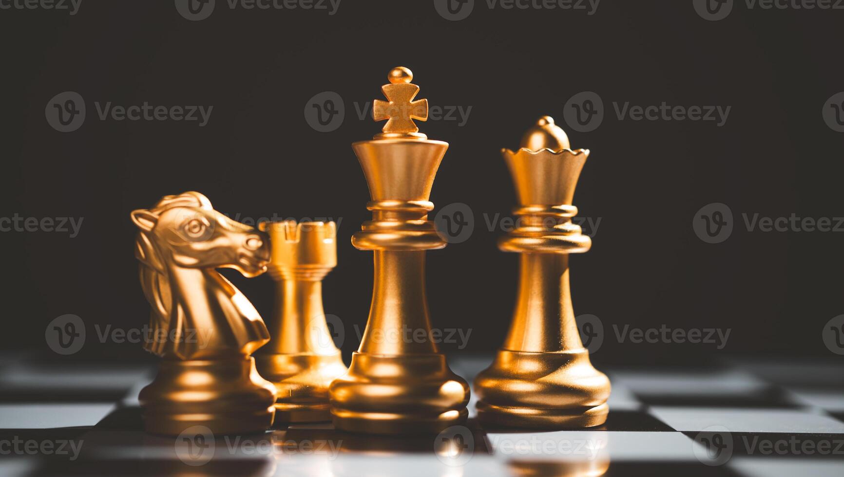 The set of golden chess pieces element is on the chalkboard.chess board game concept of business ideas and competition and stratagy plan success meaning photo