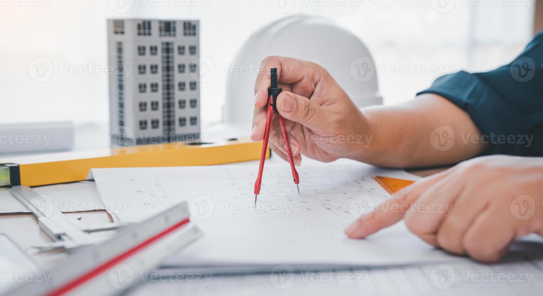 engineer working in office with blueprints, inspection in workplace for architectural plan, construction project ,Business construction photo