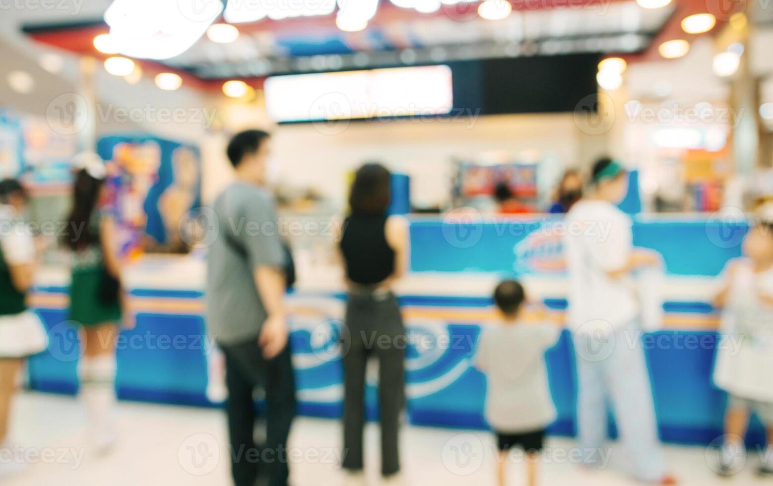 Abstract blurred of people in shopping mall of department store for background photo