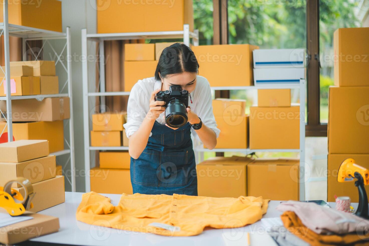 Small business owners online are taking pictures of their products and offering them to customers who will place their orders. - online shopping photo