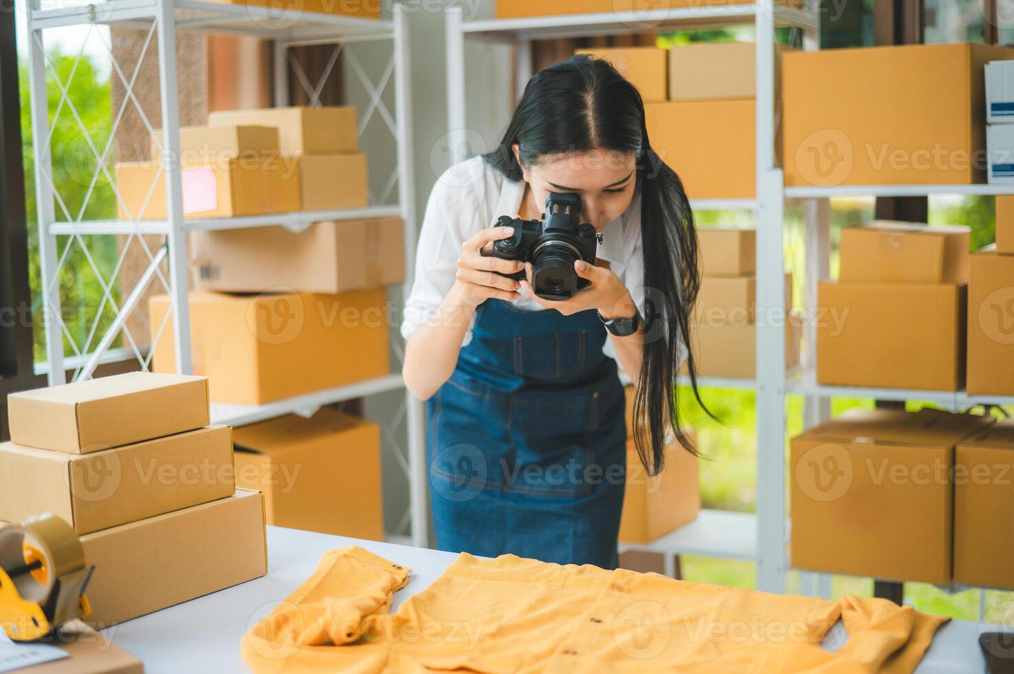 Small business owners online are taking pictures of their products and offering them to customers who will place their orders. - online shopping photo