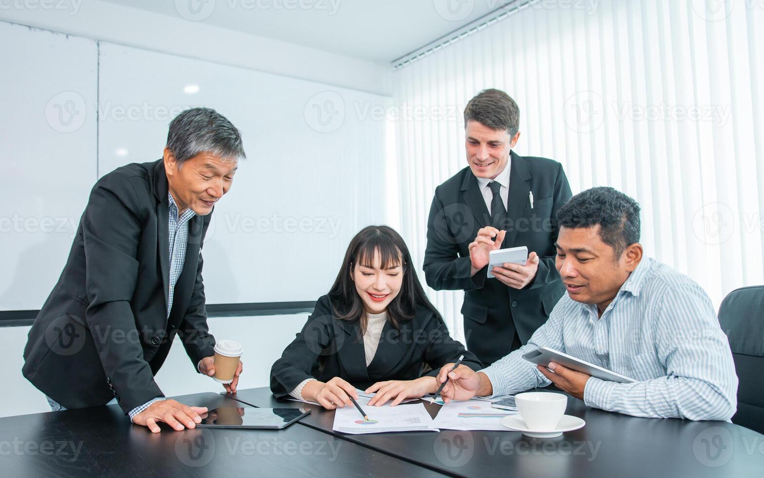 Business people team work while working in board room, design project, discussing ideas,discuss financial statistics together teamwork concept photo