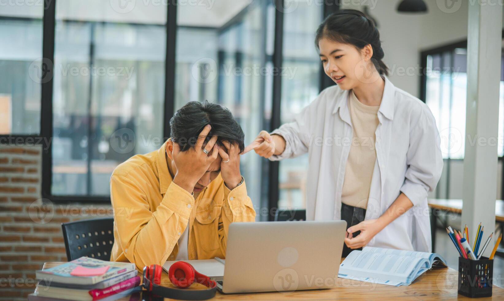Young students quarrel when their work fails and goals are not met. , communication does not understand each other photo