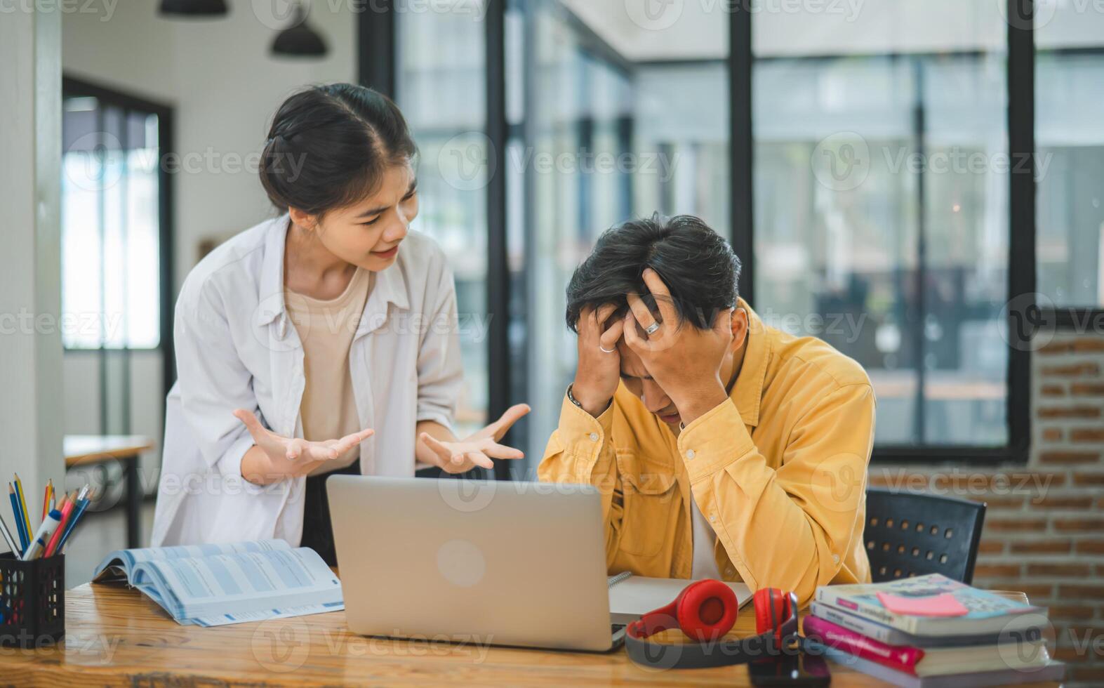Young students quarrel when their work fails and goals are not met. , communication does not understand each other photo