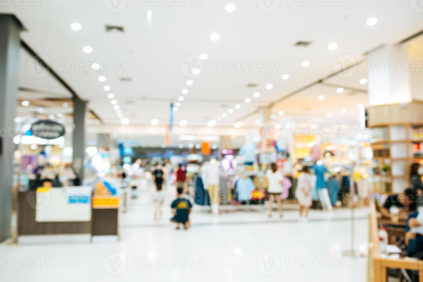 Abstract blurred of people in shopping mall of department store for background photo